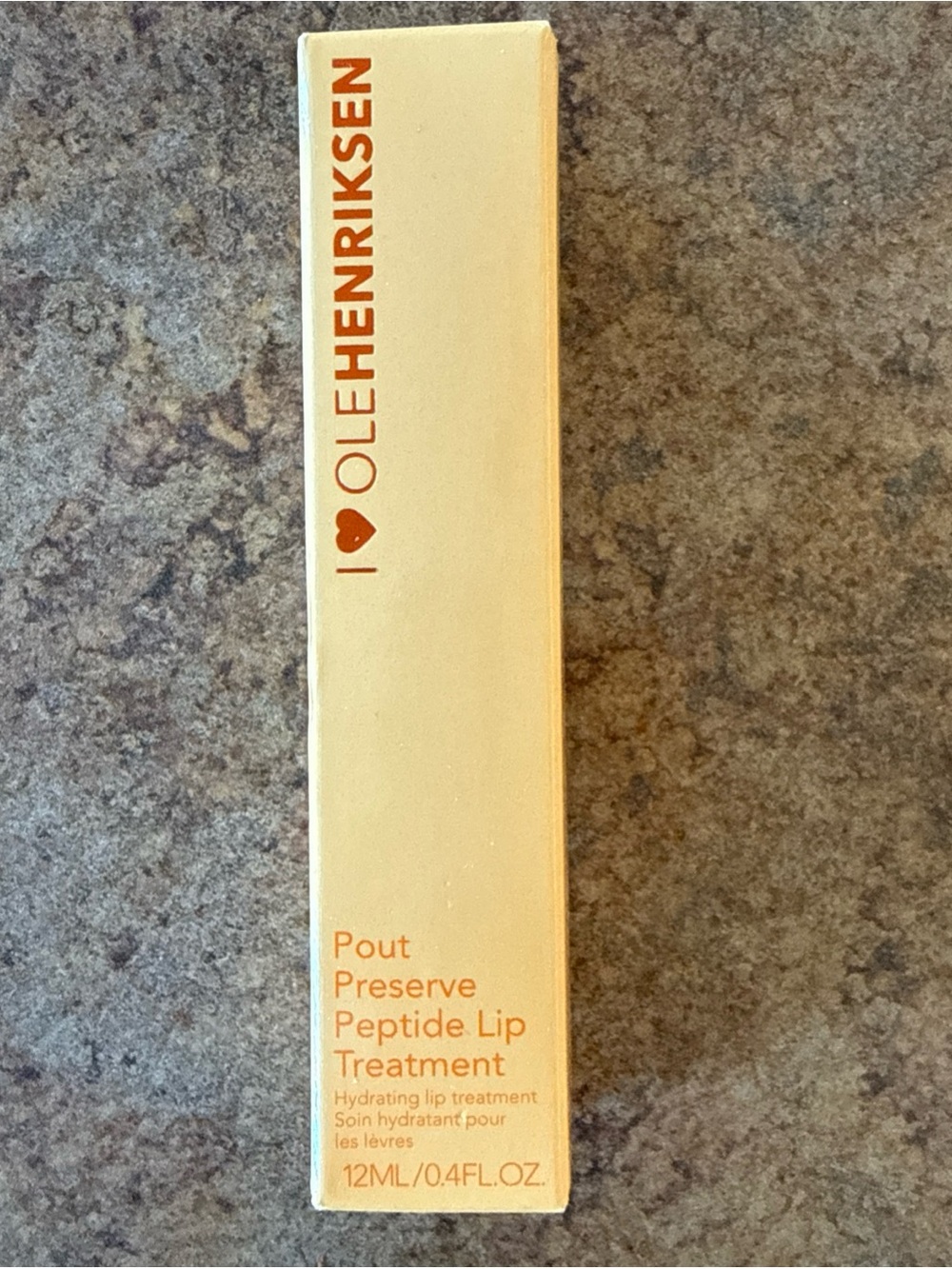 Ole Henriksen Cream Lip Treatment in Pale Yellow Packaging